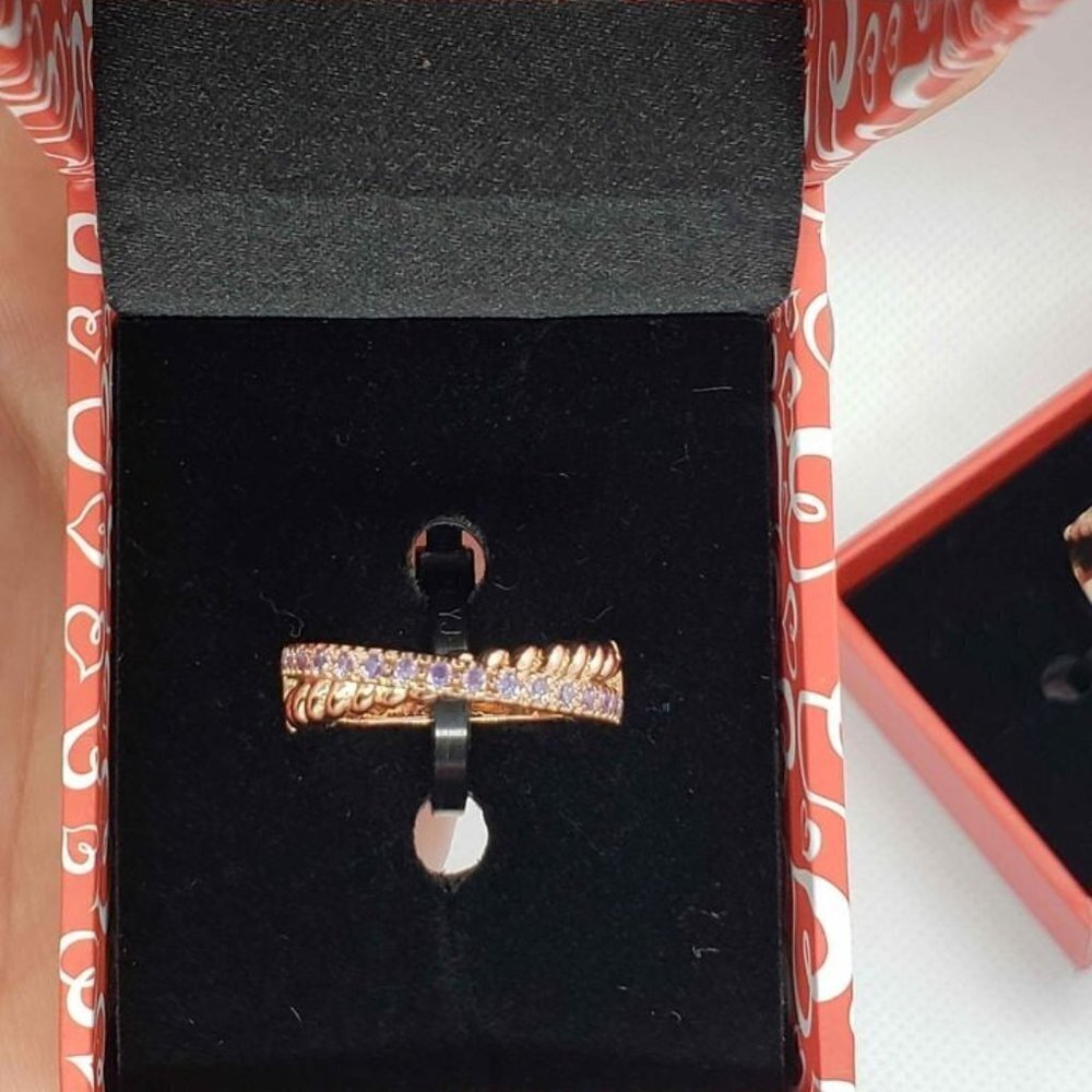 Brand New 18k rose gold plated ring with purple cubic zirconia stones